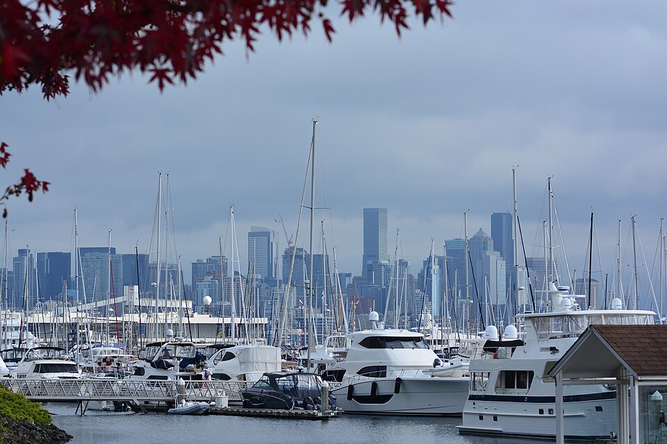 Seattle’s downtown skyline beyond sailboats at Elliott Bay Marina