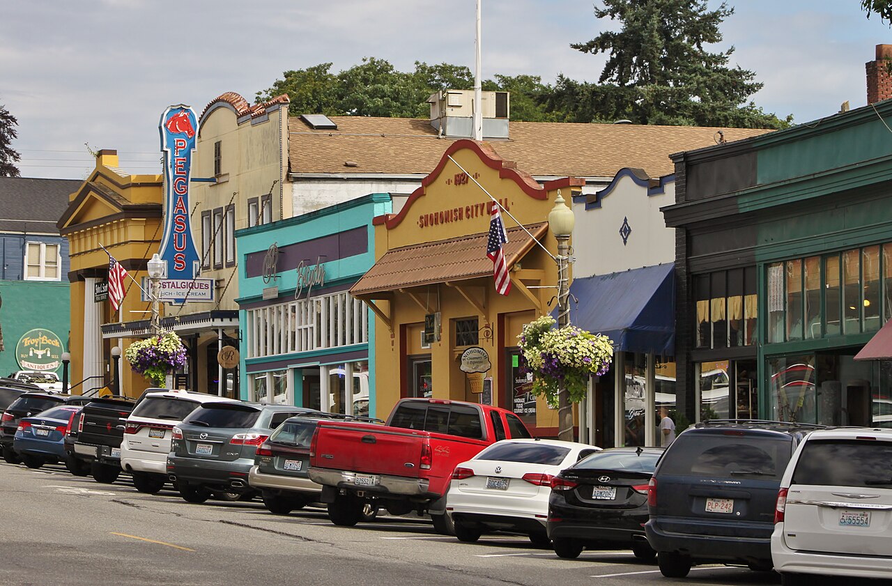 Historic storefronts and hanging flower baskets along First Street in downtown Snohomish
