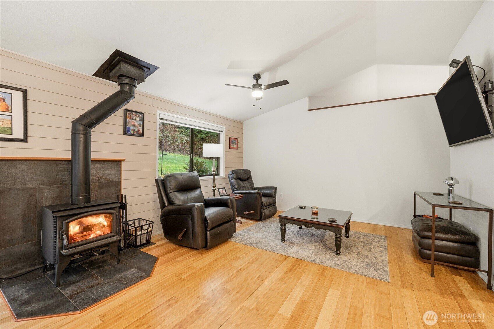 Living room with a cozy wood-burning stove
