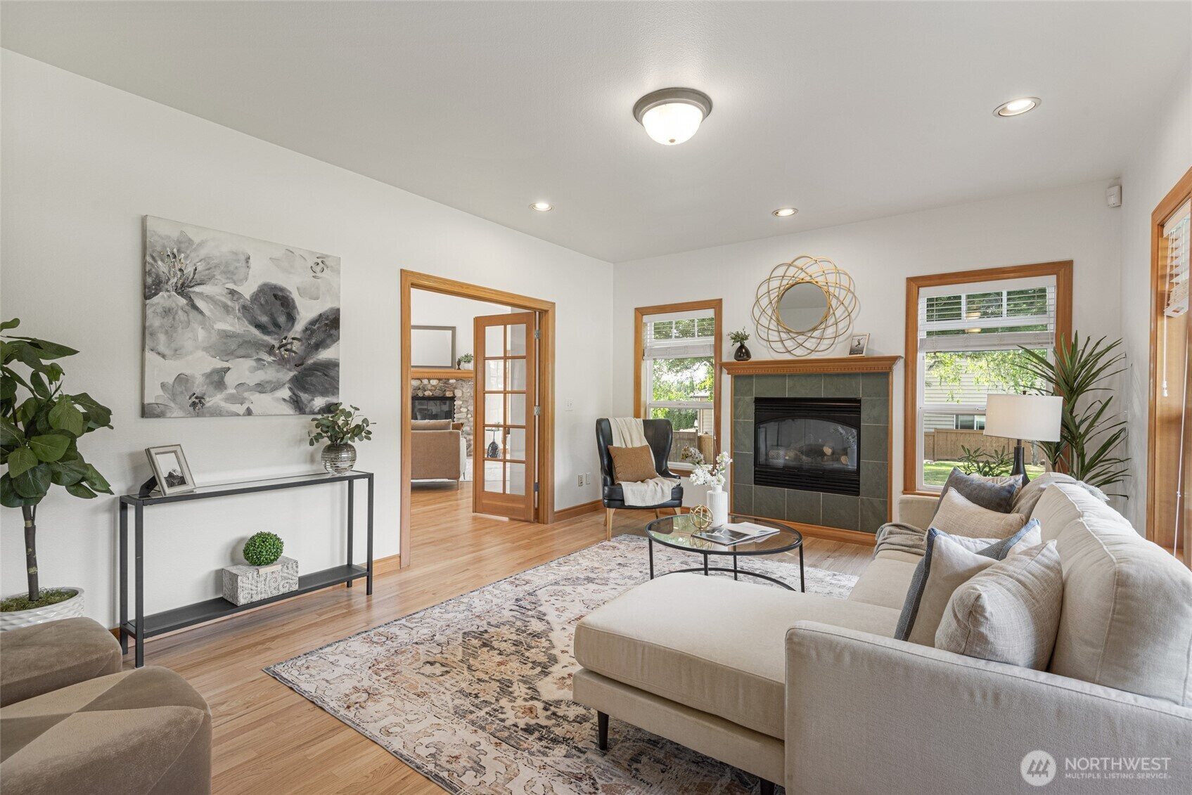 Living room with fireplace and French doors