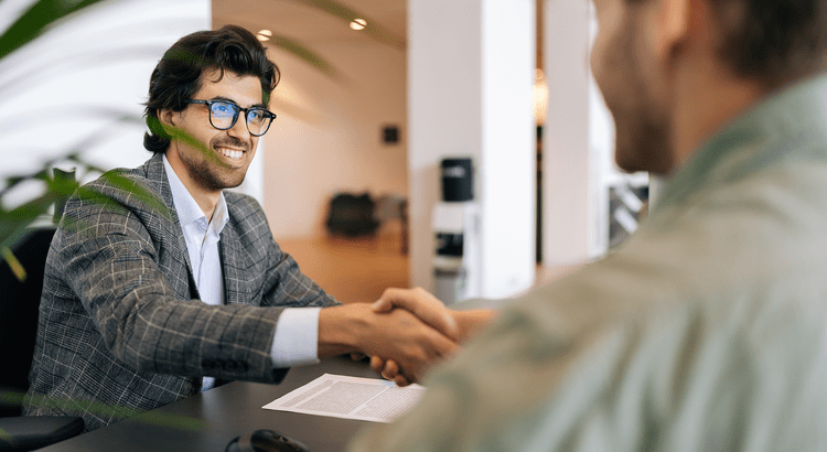 A homebuyer meeting with a mortgage or real estate professional